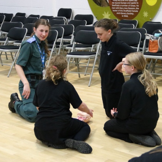 Y7 group of students learning CPR